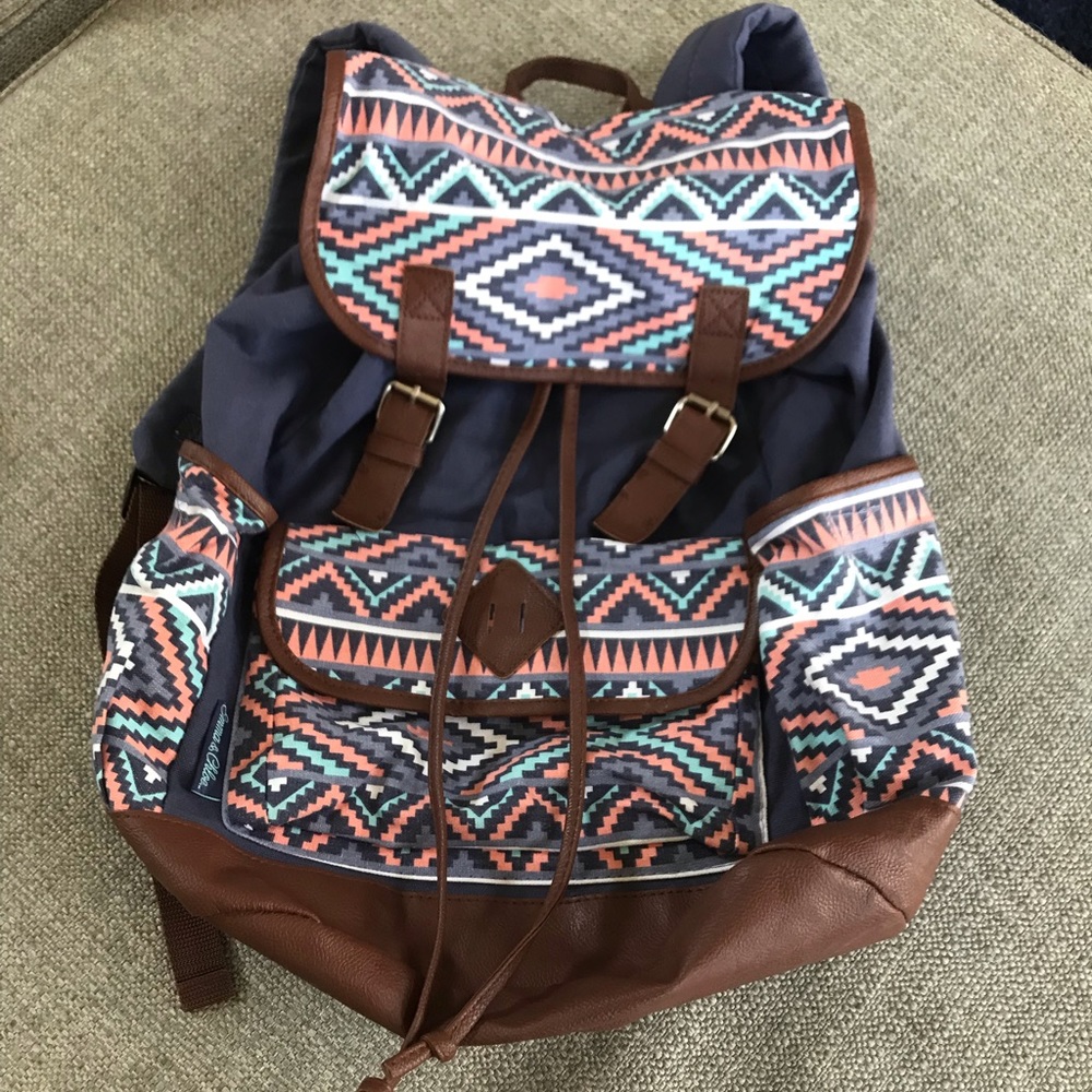 Backpack with drawstring top by Emma & Chloe.